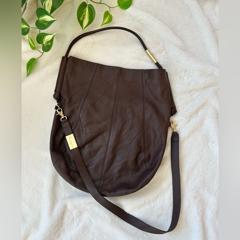 Foley + Corinna fold-over bag with shoulder handle and crossbody strap